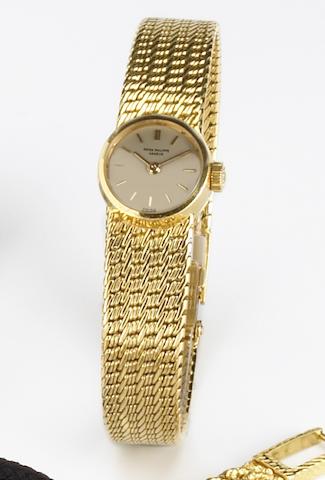 Patek Philippe. A lady's 18k gold bracelet watchRef.3266, Case No.2623077, Movement No.982191, circa 1960