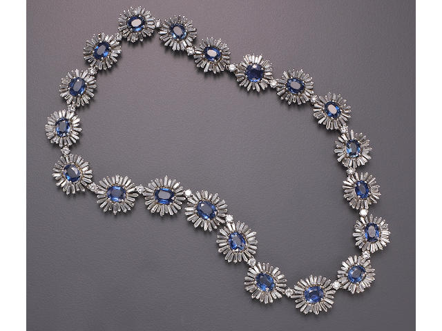 A sapphire, diamond and white gold necklace