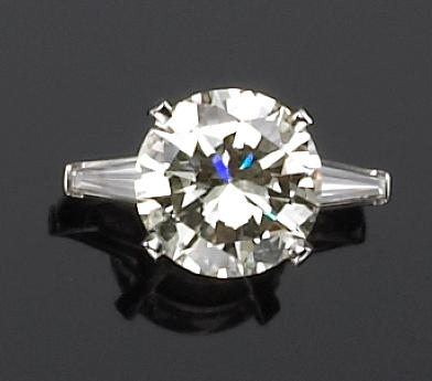 A diamond and platinum engagement ring
