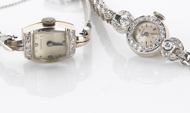 Two ladies Perraux diamond, 14k and 10k white gold wristwatches