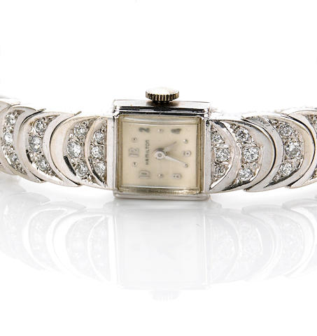 Hamilton. A Lady's 14k white gold and diamond set bracelet watch1950s