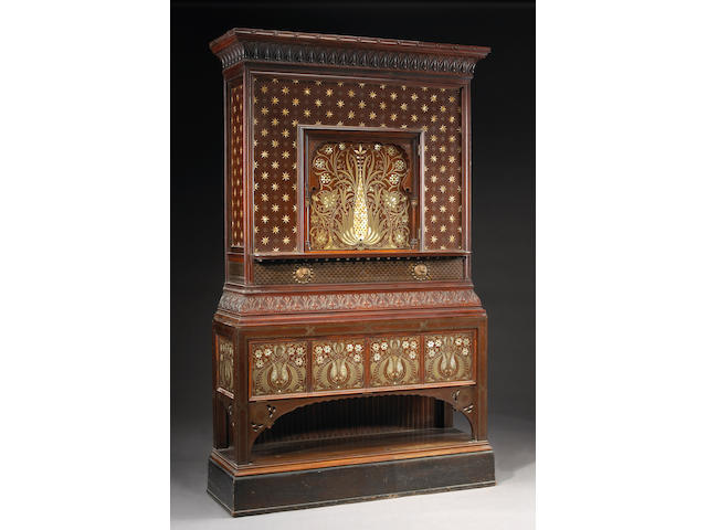 A fine Aesthetic carved rosewood and faux rosewood pewter, brass and mother of pearl inlaid collector's cabinet