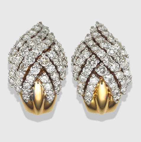 A pair of diamond and 14k gold clip-earrings