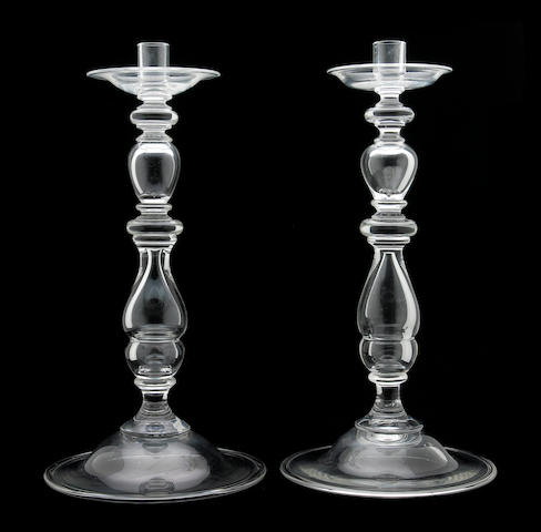 A pair of Steuben clear glass candlesticks