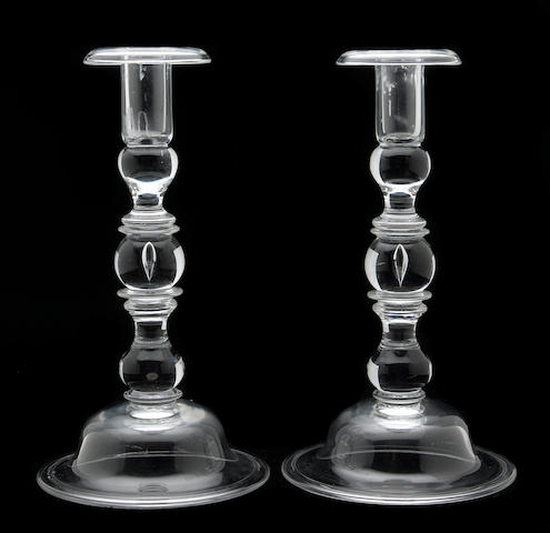 A pair of Steuben clear glass baluster candlesticks