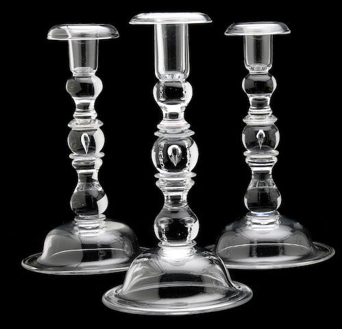 Three Steuben clear glass baluster candlesticks
