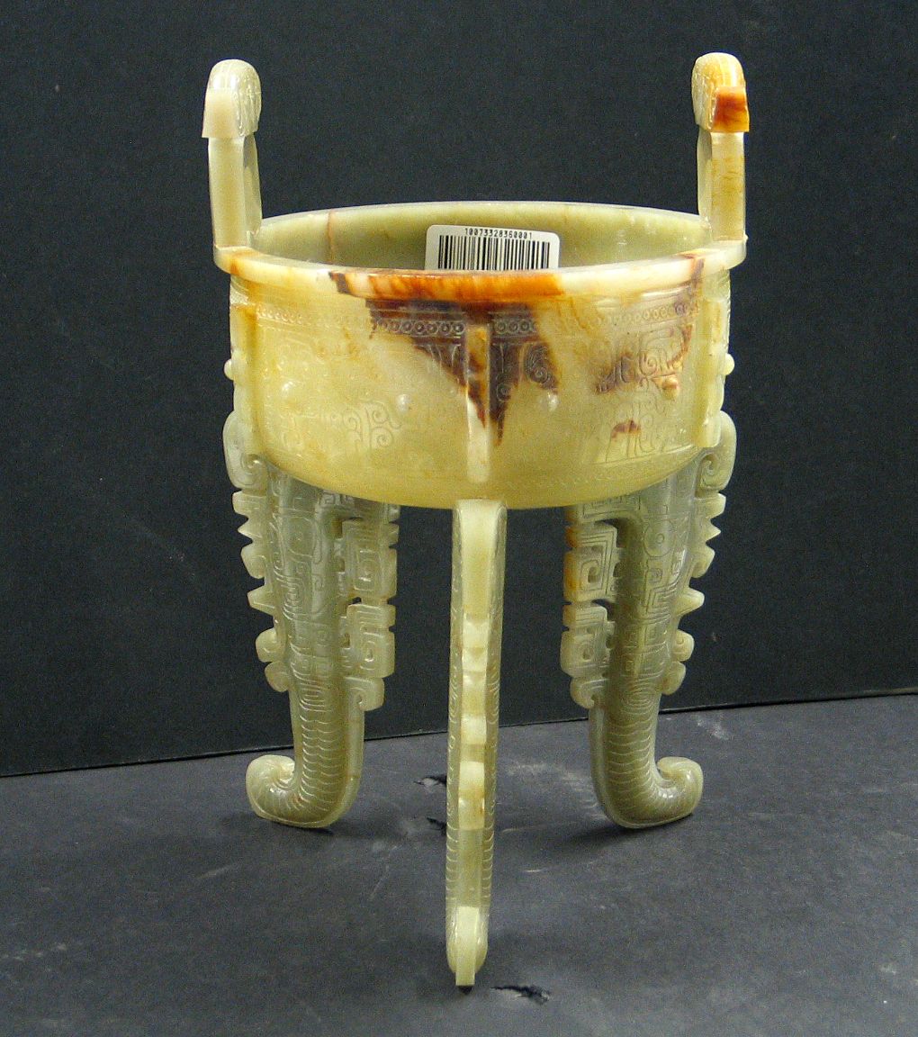 A pieced nephrite archaistic tripod ding