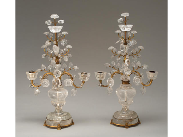 A pair of Louis XVI style gilt-metal and rock crystal candelabra