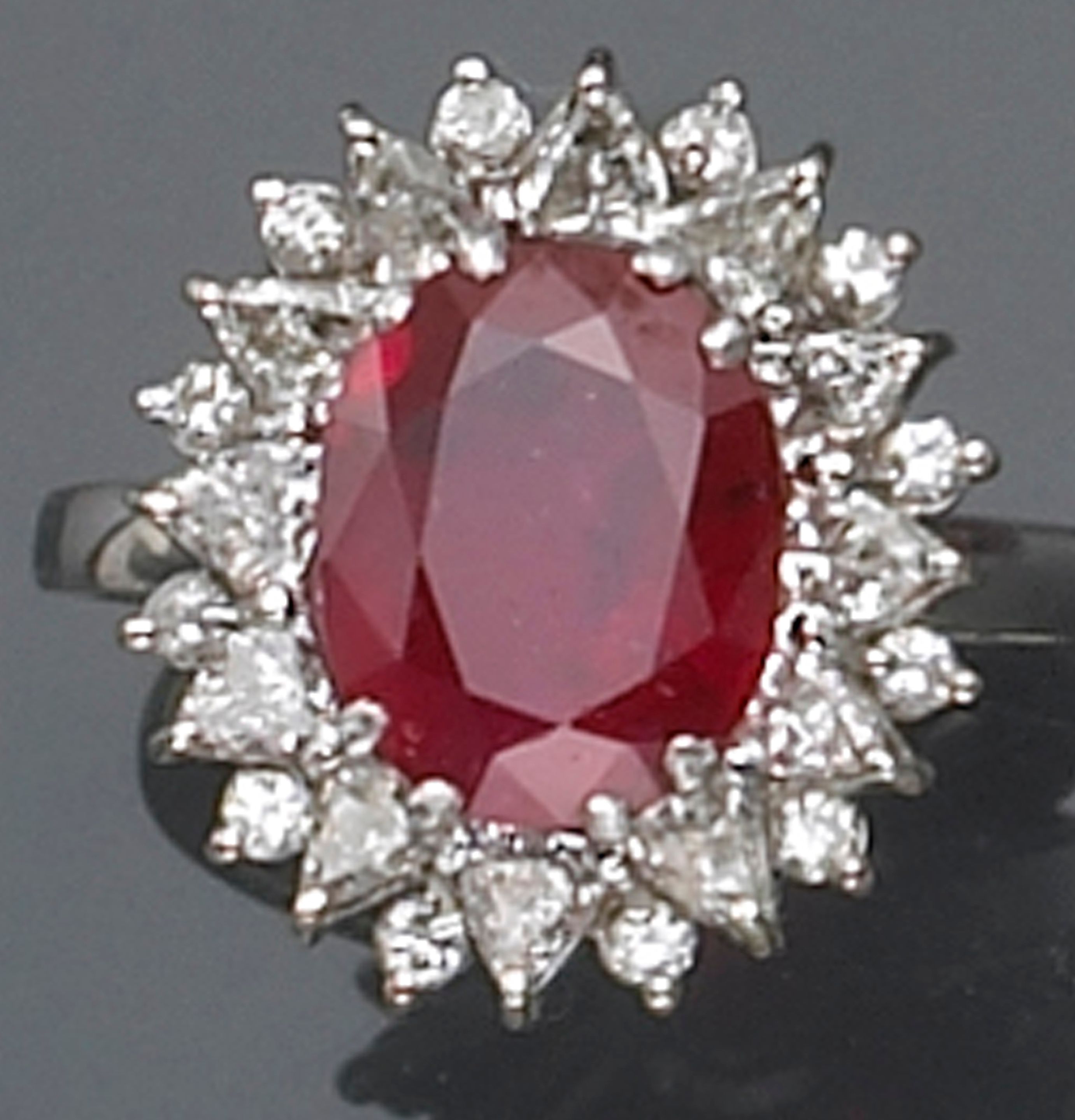 A ruby, diamond and white gold ring