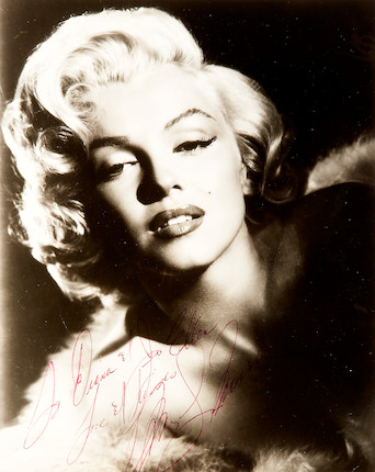 A Marilyn Monroe signed black and white photograph, circa 1955 image 1