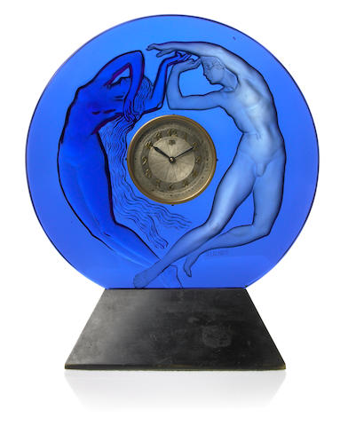 A Ren&#233; Lalique molded blue glass clock: Le Jour et la Nuit