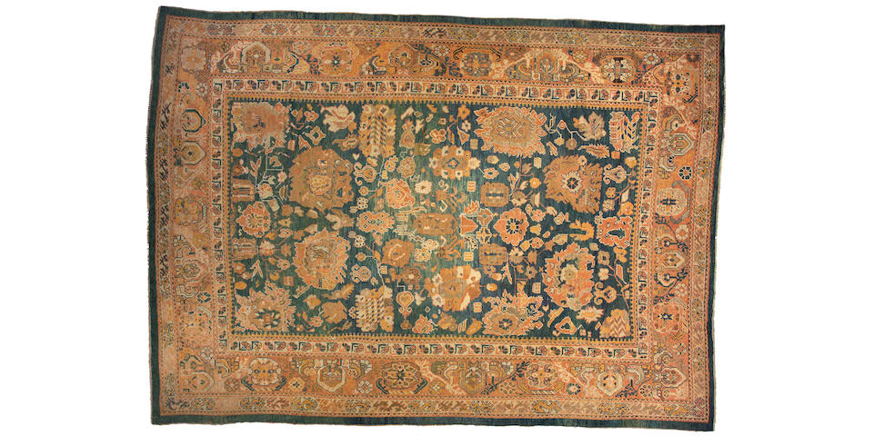 An Oushak carpet west Anatolia size approximately 10ft x 14ft 3in