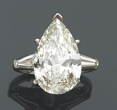 A diamond and platinum solitaire ring