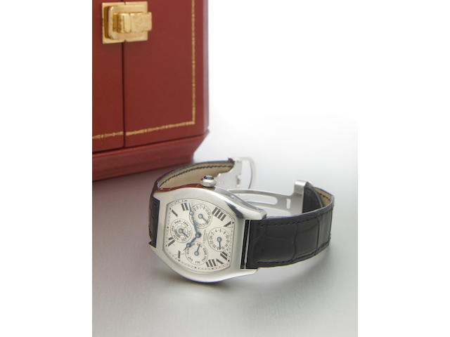Cartier. A fine and rare platinum special-edition tonneau-shape dual time zone perpetual calendar wristwatch with leap year indicatorTortue Quantieme Perpetual, Privee Collection, No.037, made circa 2004
