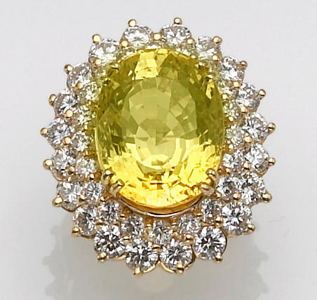 Bonhams : A yellow sapphire, diamond and eighteen karat gold ring, Élan