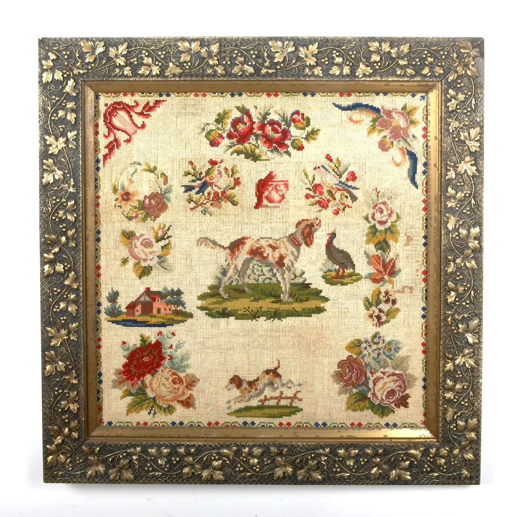 Bonhams : A framed needlepoint sampler