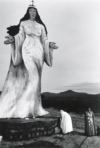 Sebasti&#227;o Salgado (Brazilian, born 1944); Two Women Making an Offering to a Goddess Statue, Brazil;
