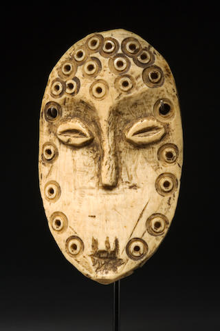A fine Lega ivory maskette, Lukungu