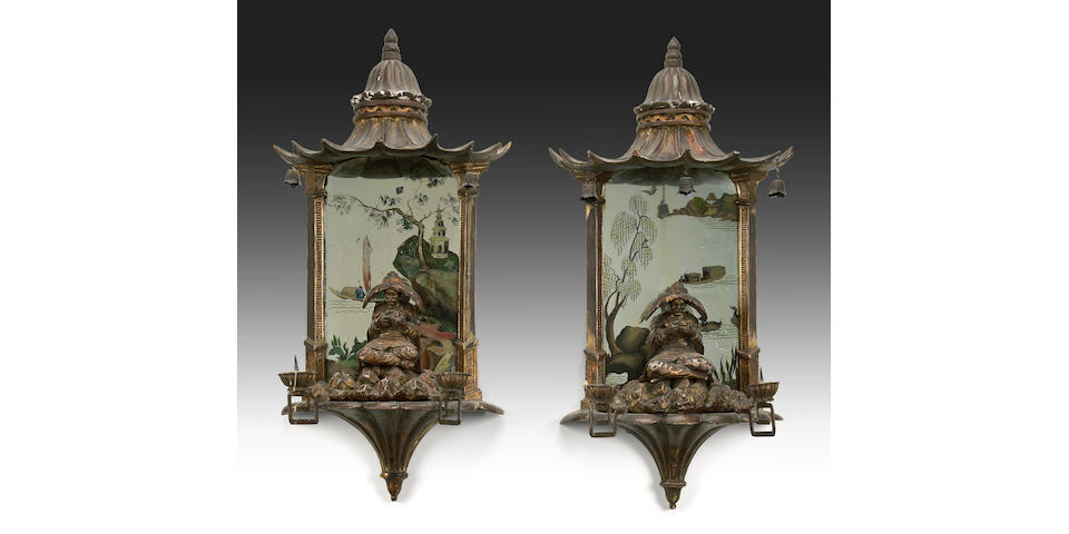 A pair of Chinoiserie pagoda form two light mirrored sconces