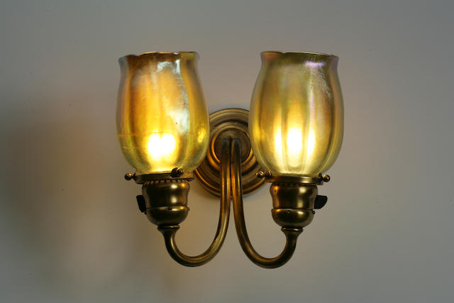 A Tiffany Studios Favrile glass and gilt-bronze two-arm sconce
