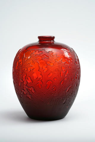 A Ren&#233; Lalique molded red glass vase: Acanthus