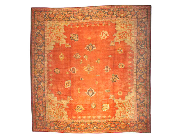An Oushak carpet West Anatolia, size approximately 13ft. 5in. x 14ft. 5in.