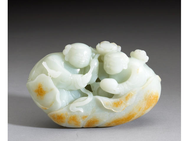 A celadon jade carving of the Hehe twins