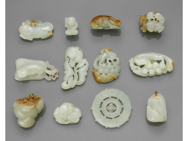 A group of twelve carved jade decorations Late Qing/Republic Period