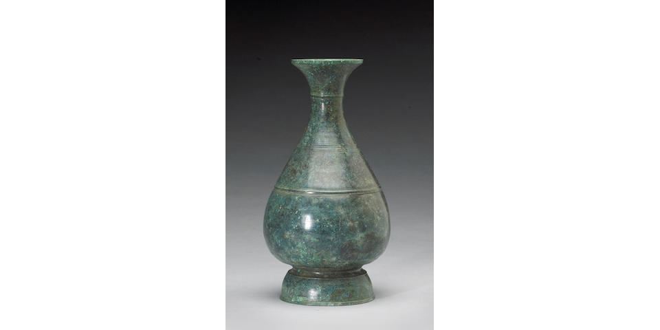 A Khmer bronze bottle vase 13th - 15th Century