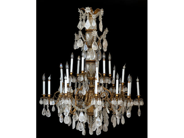 A Louis XV style gilt bronze and rock crystal twenty-four light chandelier