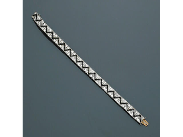 An art deco diamond and black onyx strap bracelet, French