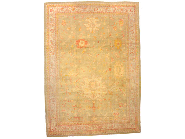 An Oushak carpet West Anatolia, size approximately 10ft. x 14ft.