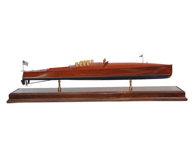 A scale model of the competition speedboat "Dixie II" 51in long by 12in wide by 43 1/2in high