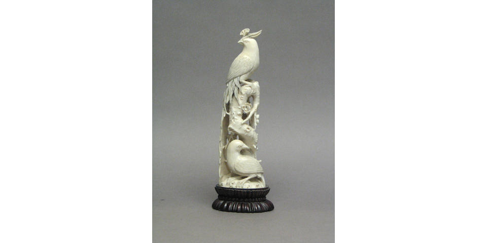A Chinese carved ivory phoenix