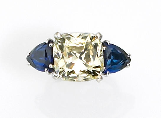A diamond and sapphire ring