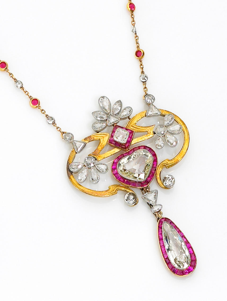 An antique diamond and ruby pendant necklace, French,