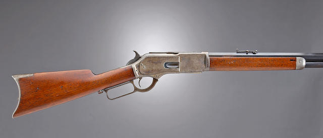 A Winchester early 2nd Model 1876 lever action rifle