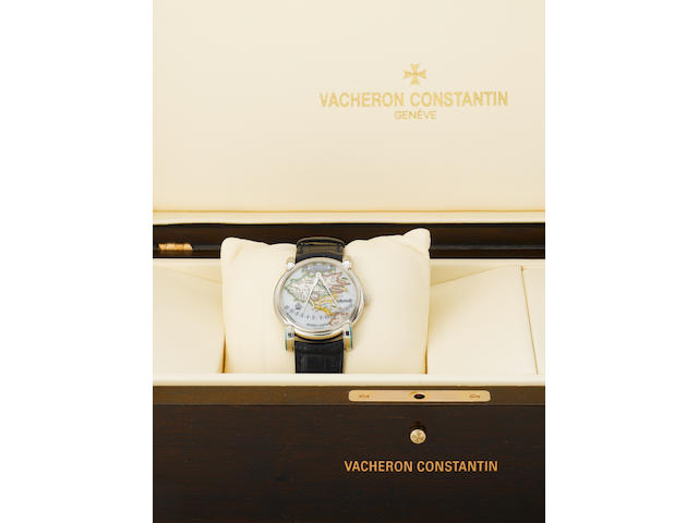 Vacheron Constantin. A fine and unusual platinum automatic wristwatch with retrograde marine divider hands over an enamel map of America with an 18K white gold Vacheron Constantin double deployant clasp together with the original fitted box and certificate"G&#233;rard Mercator 1594-1994", Movement No.862079, Case No.756200, Ref:43050, Made in a limited edition in 2001