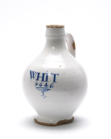 A rare English Delft wine bottle