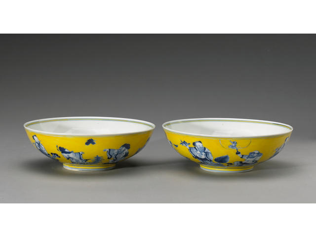 A pair of blue and white porcelain 'Eight Immortals' bowls Guangxu Marks and Period, the yellow enamel possibly added later