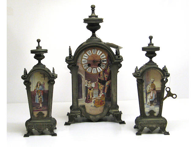 A French silvered bronze and ceramic mounted three piece clock garniture in the Islamic taste