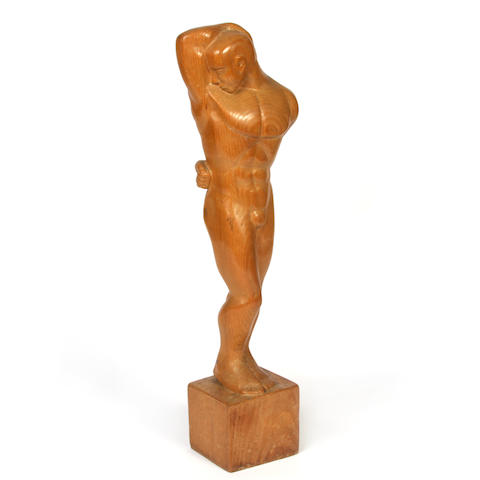 A contemporary carved oak figure of a man