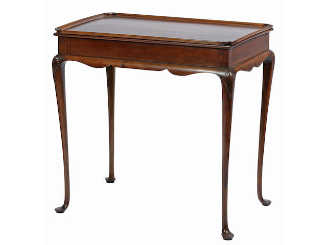 A Queen Anne style cherrywood tea table