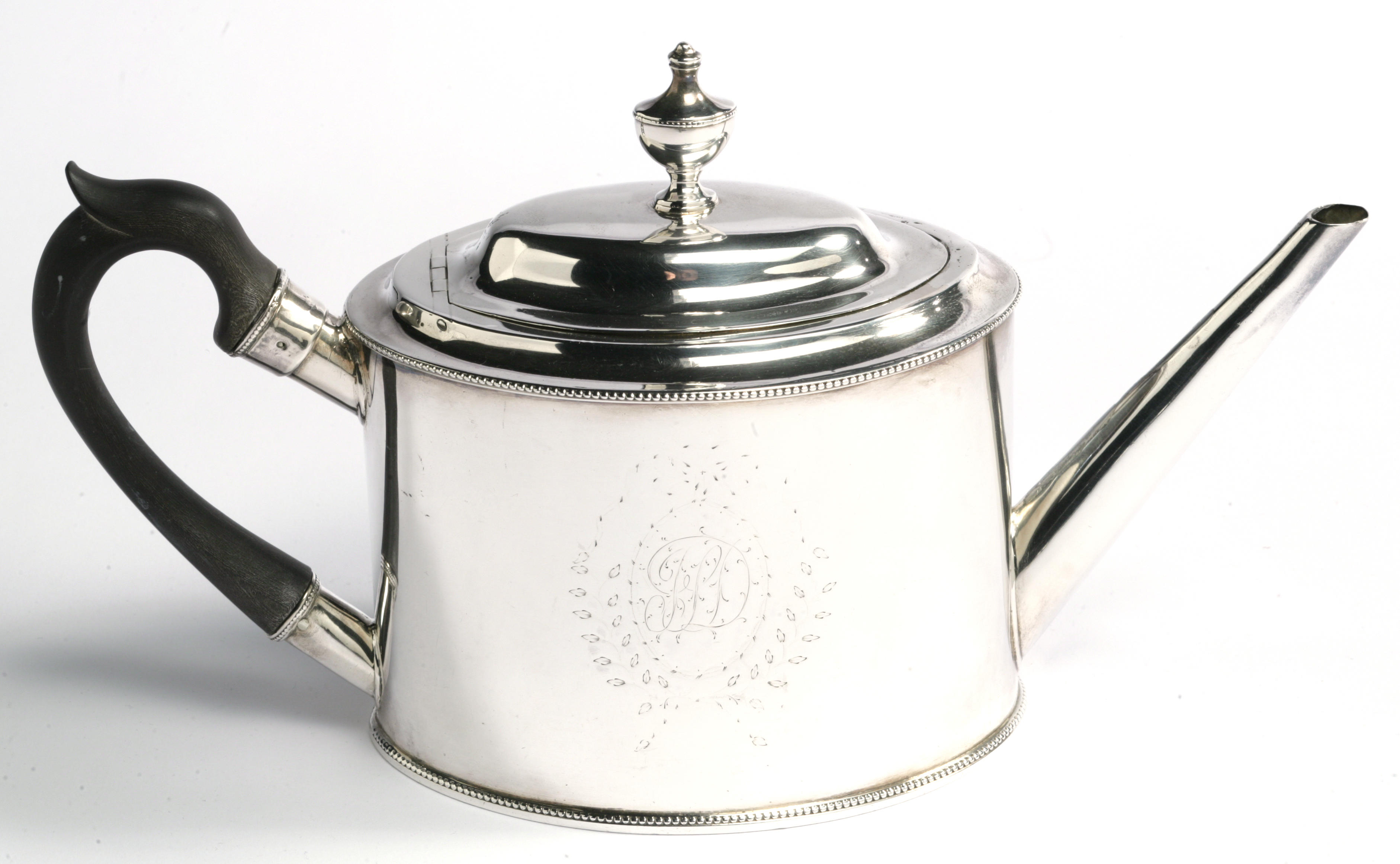 An American silver teapot.