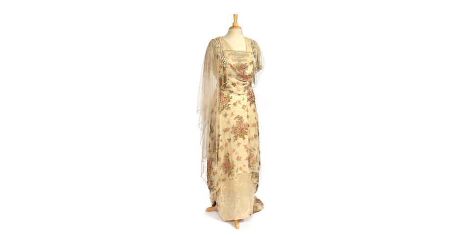 A collection of vintage and antique ladies evening dresses