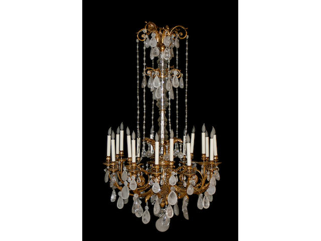 A fine Louis XVI style gilt bronze and rock crystal eighteen light chandelier