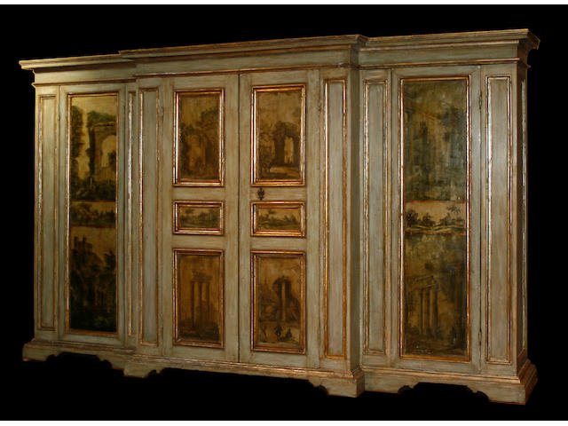 A Northern Italian parcel gilt and paint decorated cabinet
