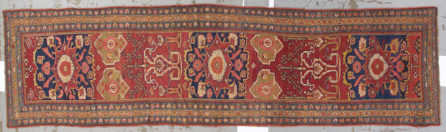 A Kurdish rug Western Persia size approximately 3ft. 8in. x 13ft.