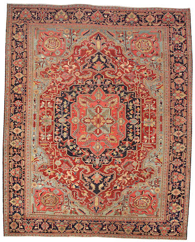 A Heriz carpet Northwest Persia size approximately 12ft. x 15ft.