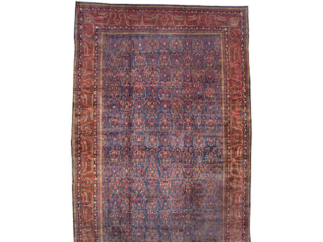 A Sarouk carpet Central Persia size approximately 13ft. 9in. x 21ft. 9in.